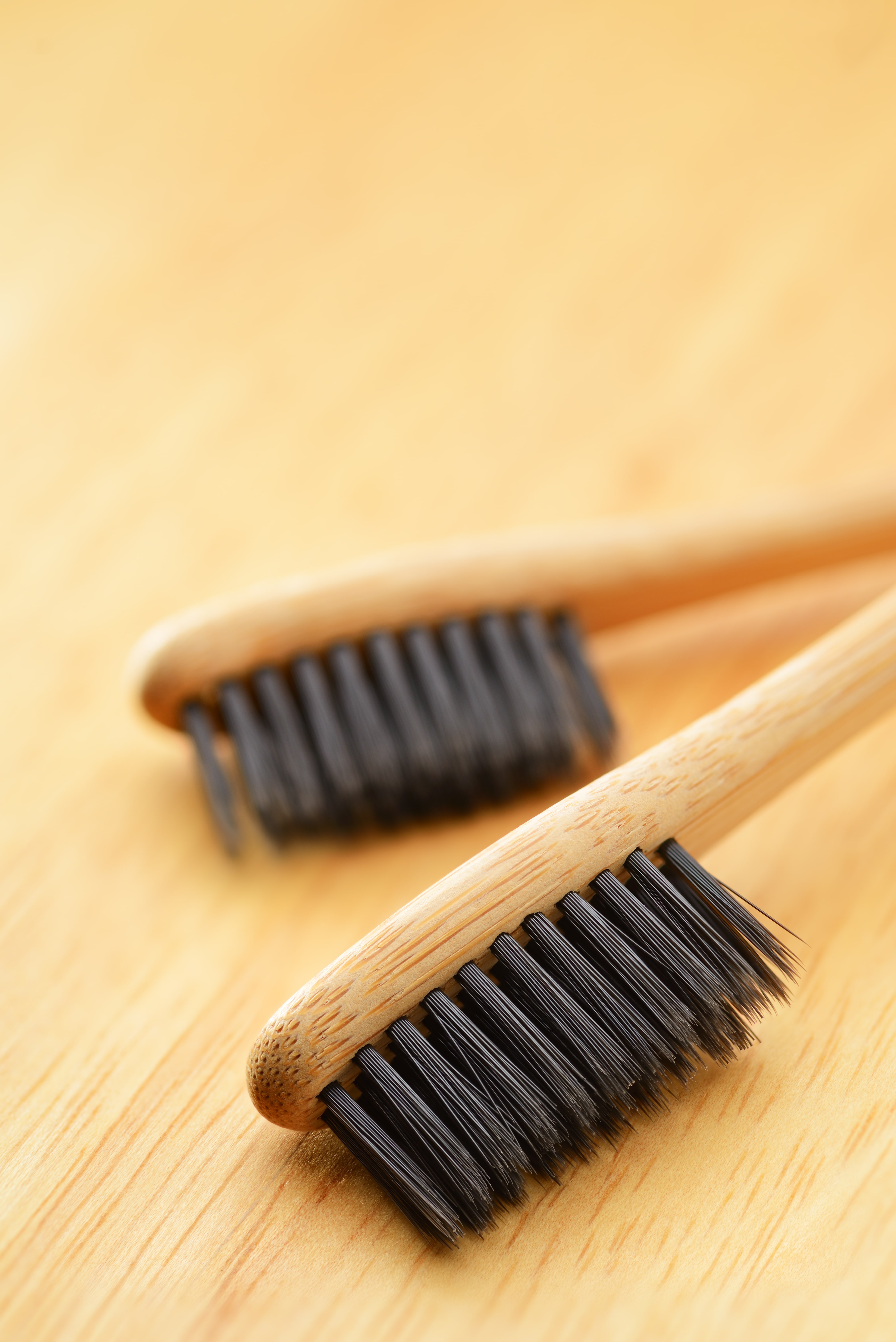 headphones cleaning roughly with a toothbrush